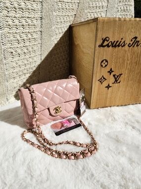 Chanel Classic Quilted Mini Flap Bag in Pink